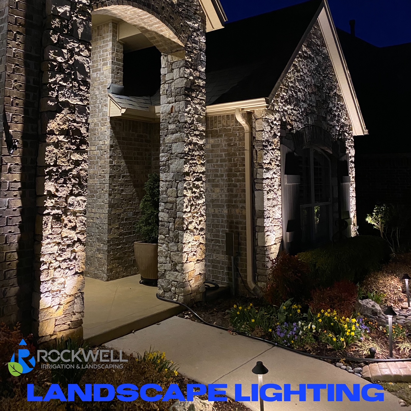 Tulsa area landscape lighting installation with beautiful house uplights and garden bed lamps